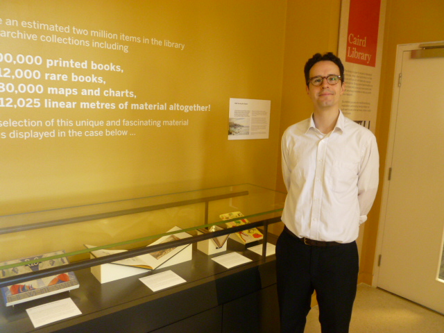 Daniel Davies by the display at the Caird Library