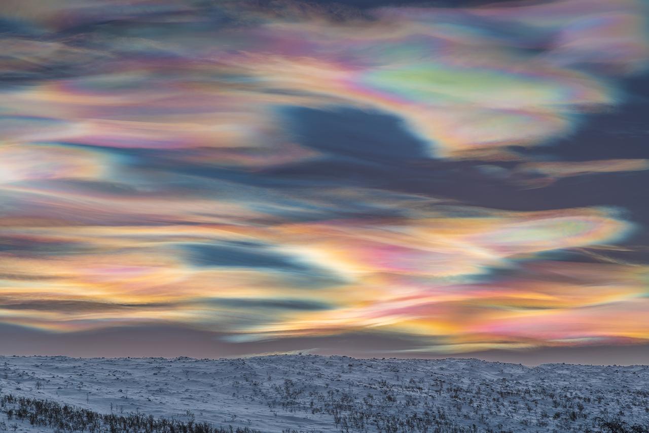 A photo of multi-coloured Nacreous clouds filling the sky