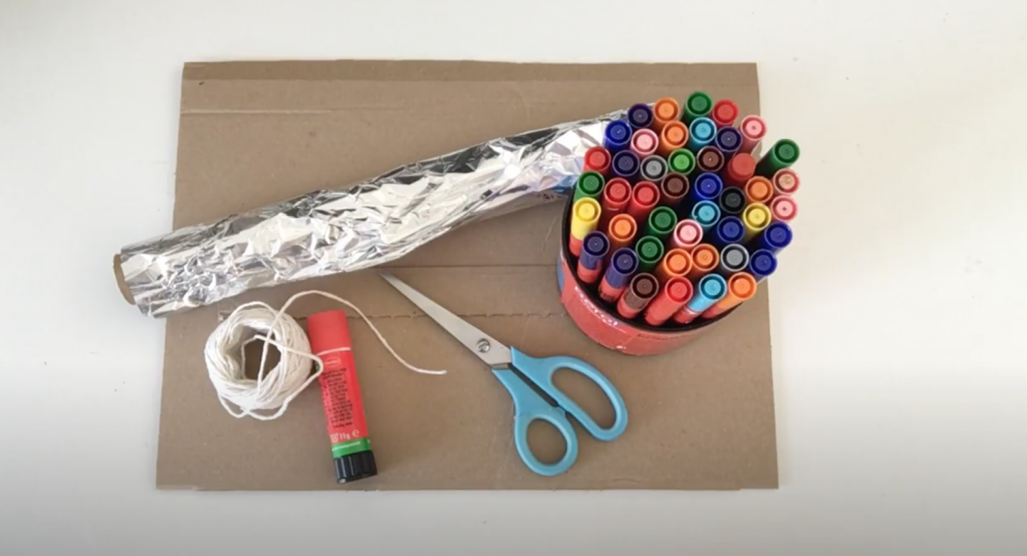 aluminium foil, string, glue, scissors, coloured pens, brown cardboard