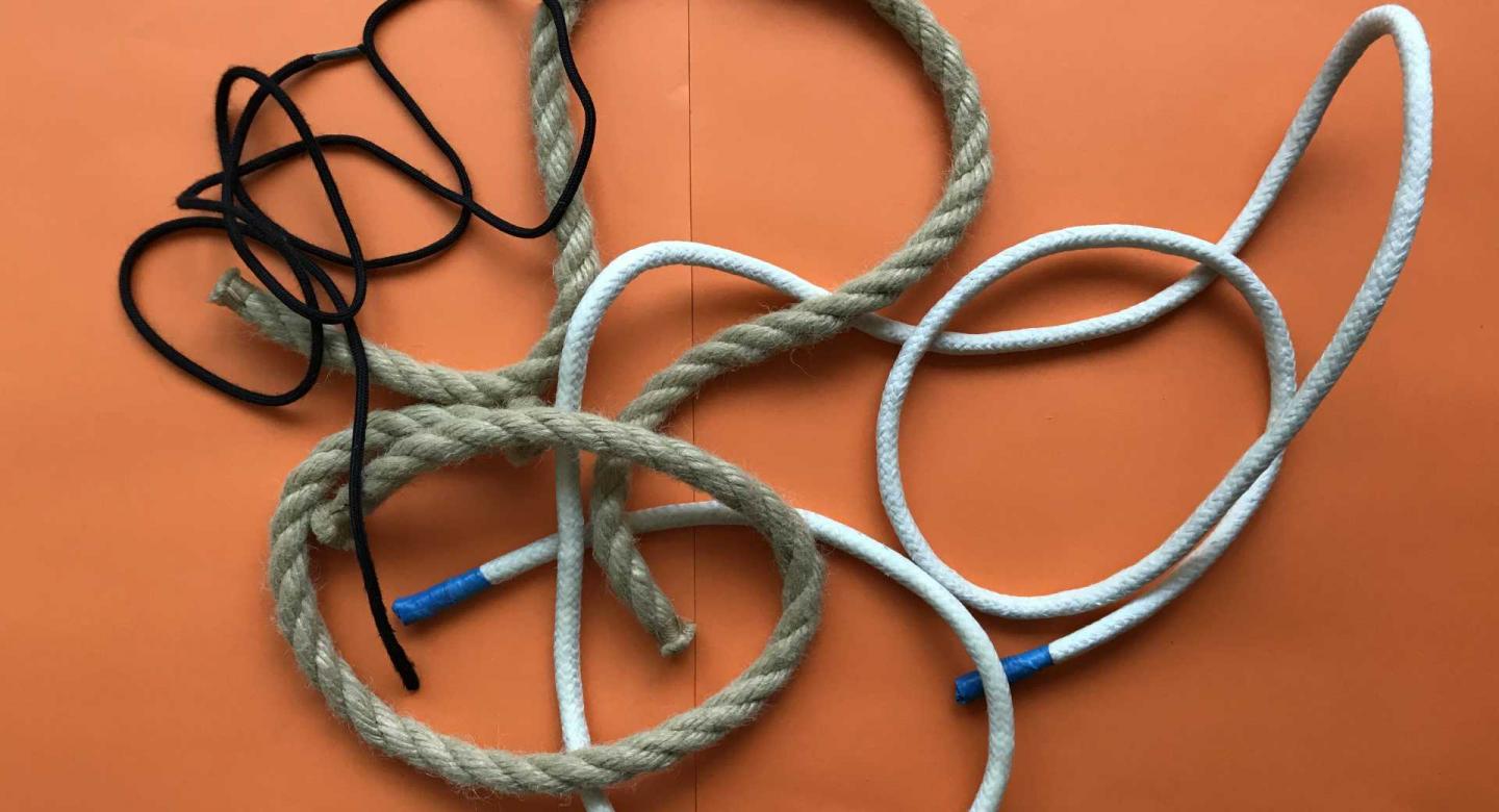 a collections of different types of rope and string