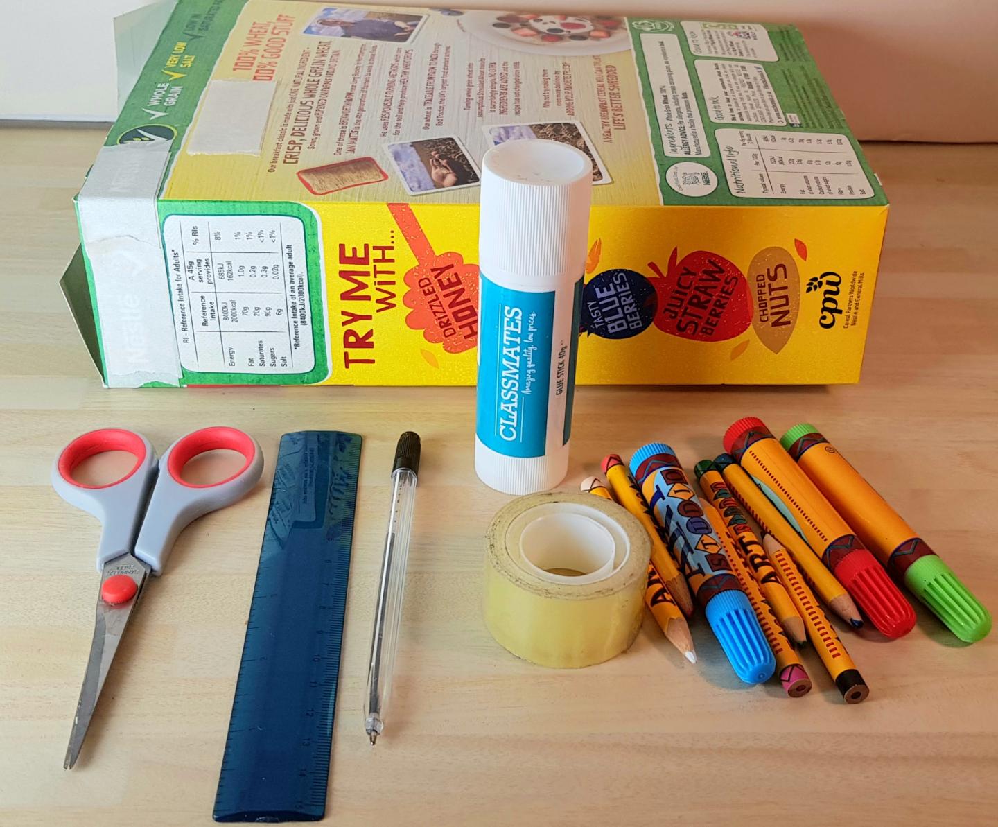 cereal box, glue stick, scissors, ruler, tape, pen, coloured pens and pencils