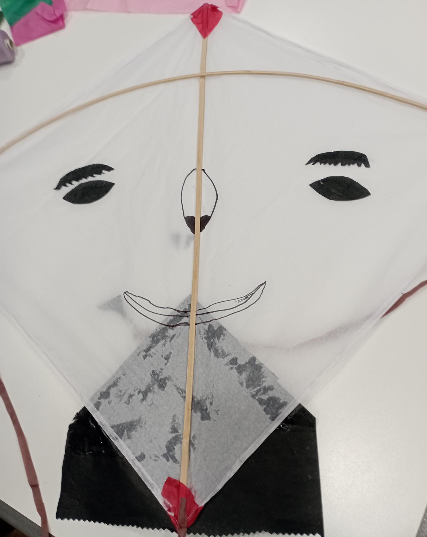 paper kite with face