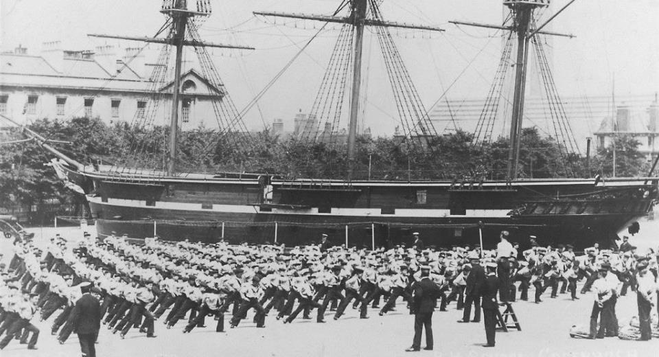 Boys at Royal Hospital School exercising by the training ship Fane, 1905