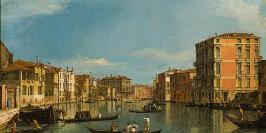 A painting of the Grand Canal in Venice by Canaletto. Gondolas dominate the foreground, with palaces and buildings lining the canal