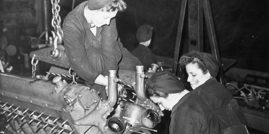 4 women fixing an engine onboard a ship