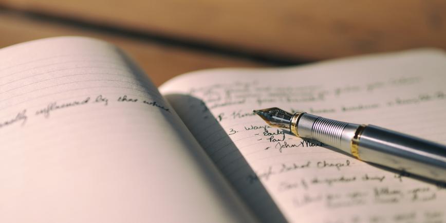 Written journal and pen