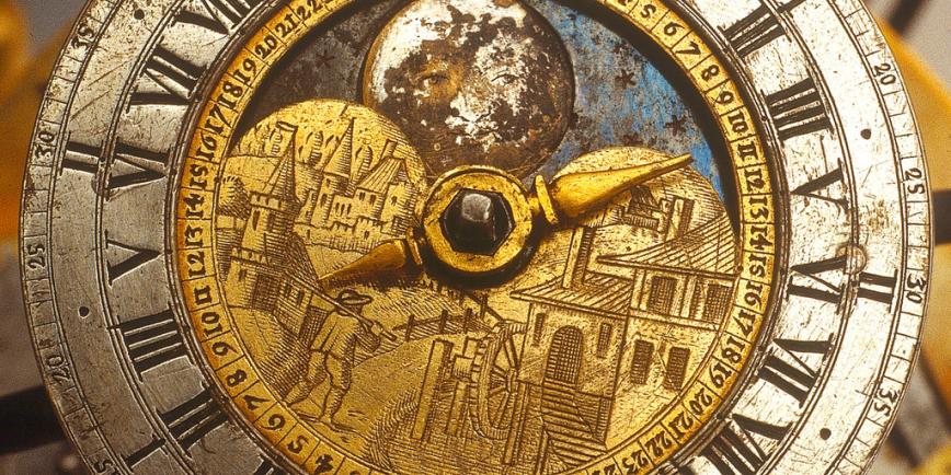 Detail of a celestial clockwork globe, showing a clockface with Roman numerals around the dial