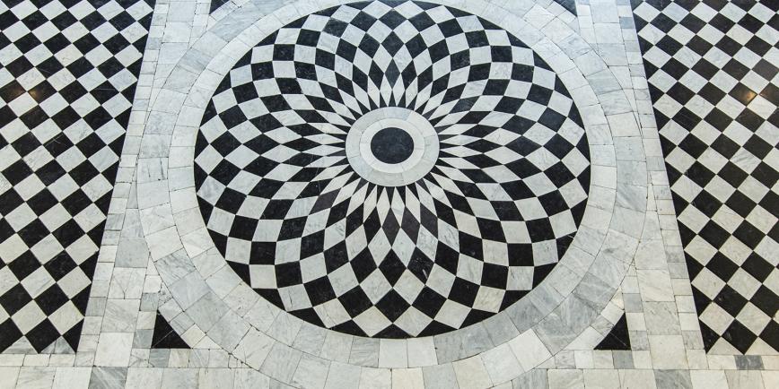 Black and white checkerboard floor of the Great Hall in the Queen's House