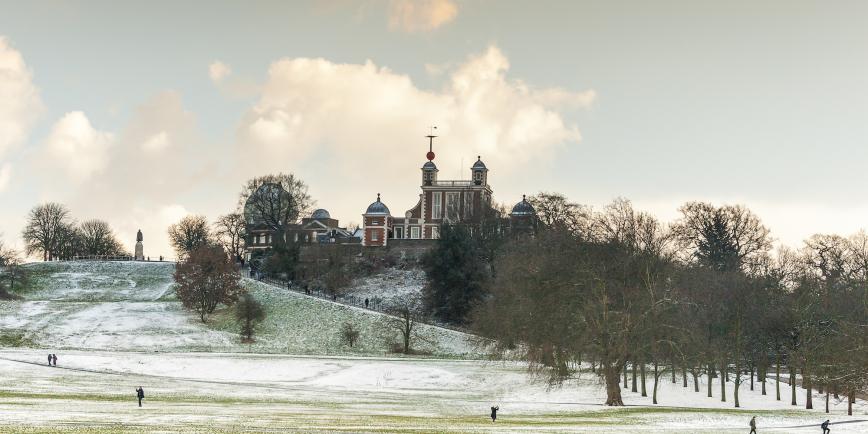 Winter sunlight in Greenwich Park, with the buildings of the Royal Observatory visible on the hill