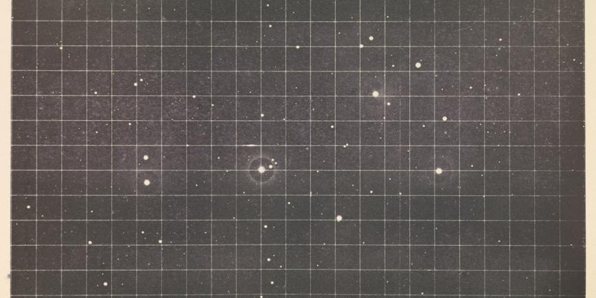 a historical photograph of stars the night sky in black and white