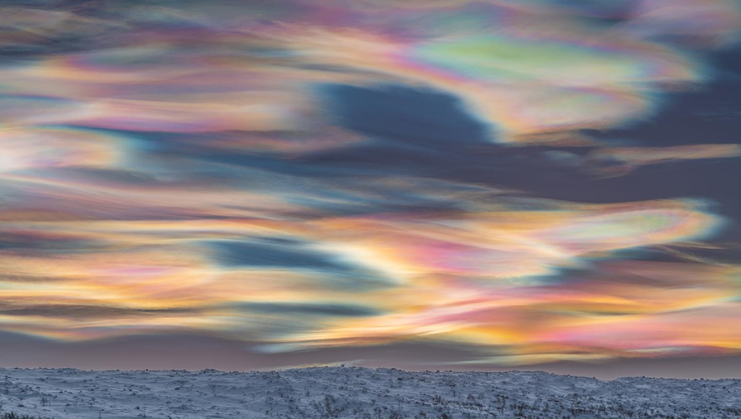 A photo of multi-coloured Nacreous clouds filling the sky