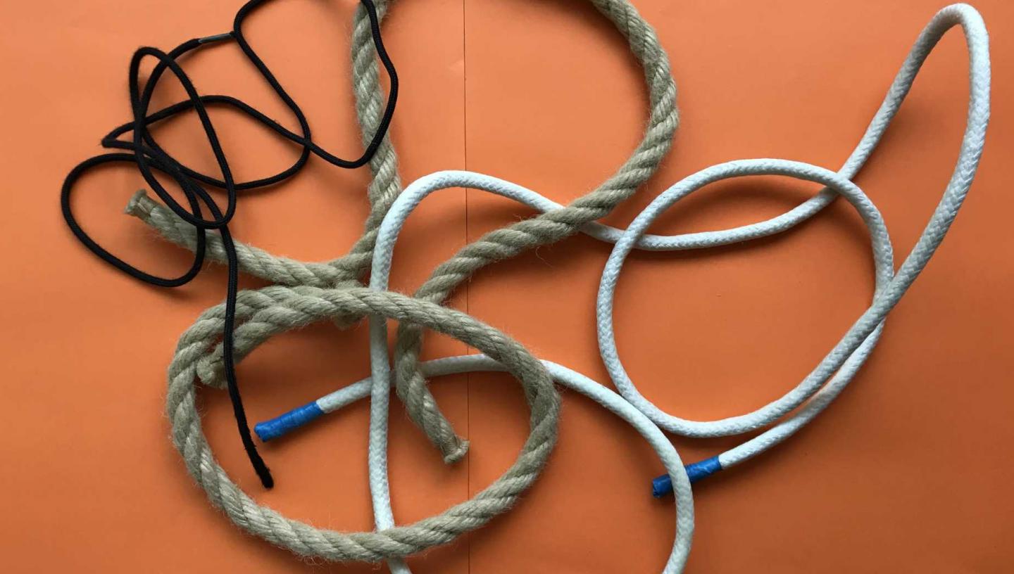 a collections of different types of rope and string