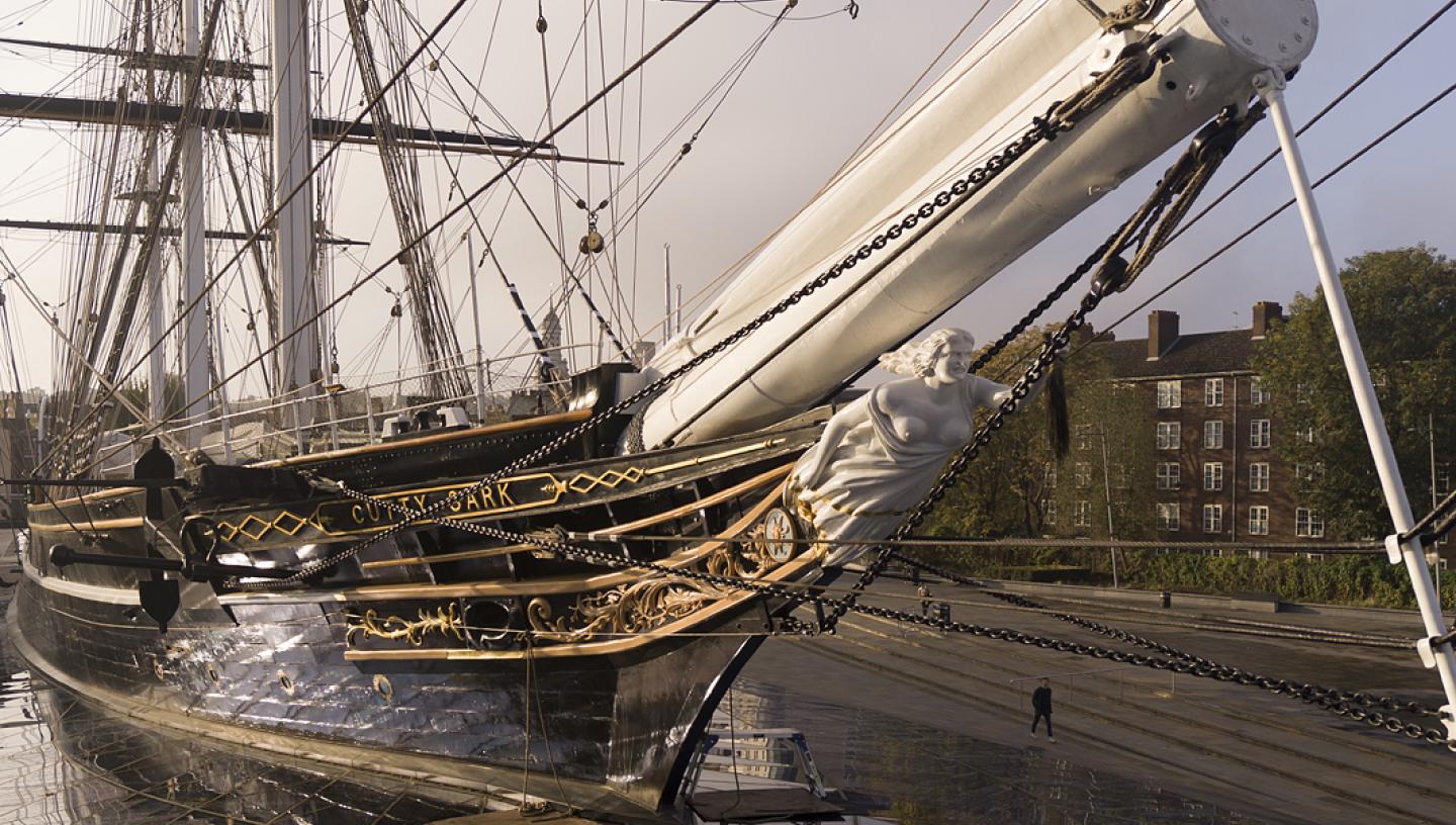 A bow view of Cutty Sark, with the ship's figurehead 'Nannie' visible