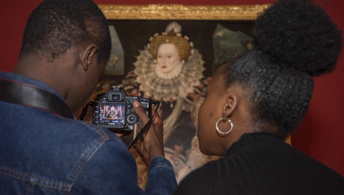 Students looking at the Armada portrait of Elizabeth I