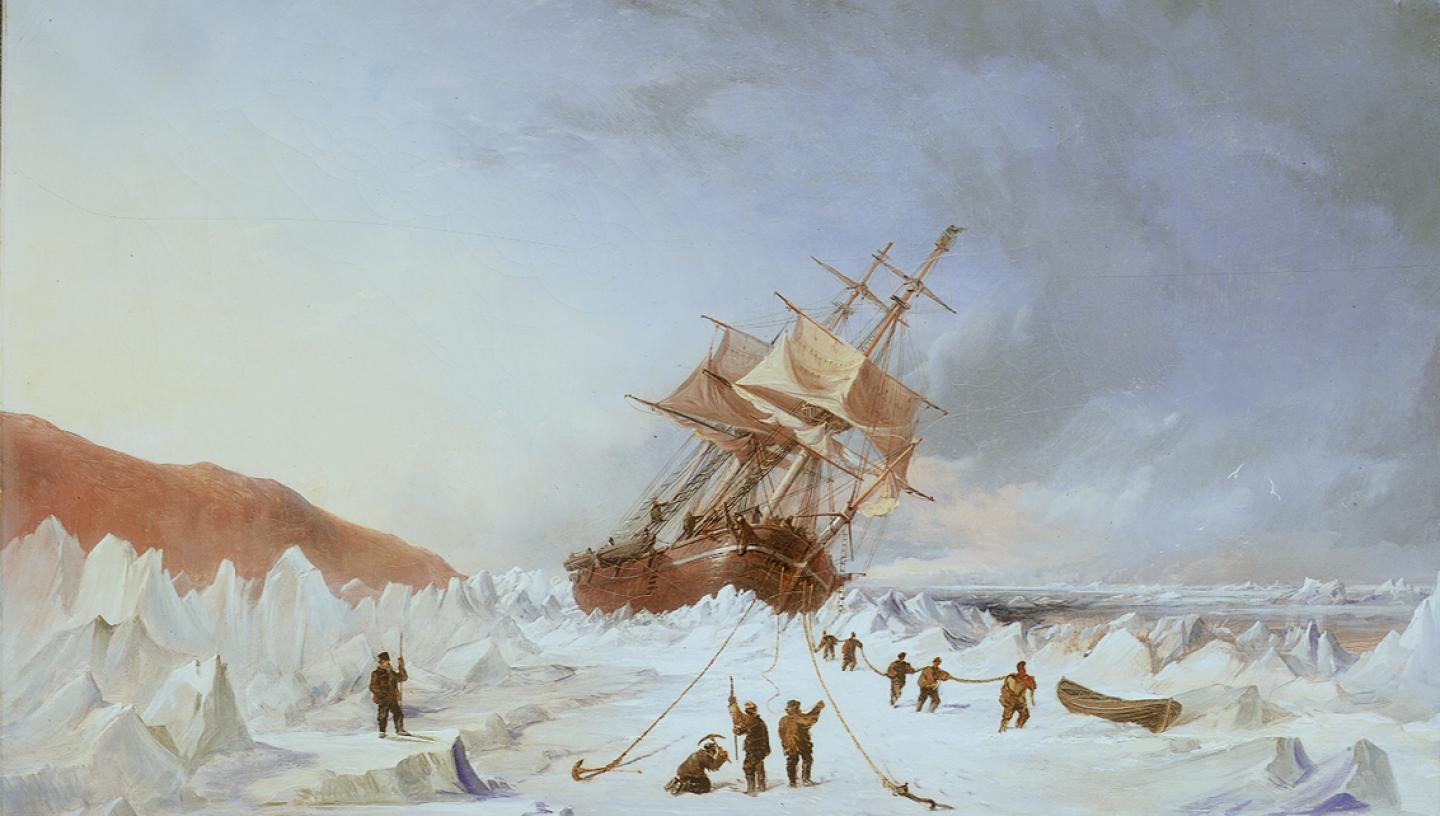 A painting of an historic sailing ship stuck in the ice, with a group of figures standing around and unloading sledges in the foreground