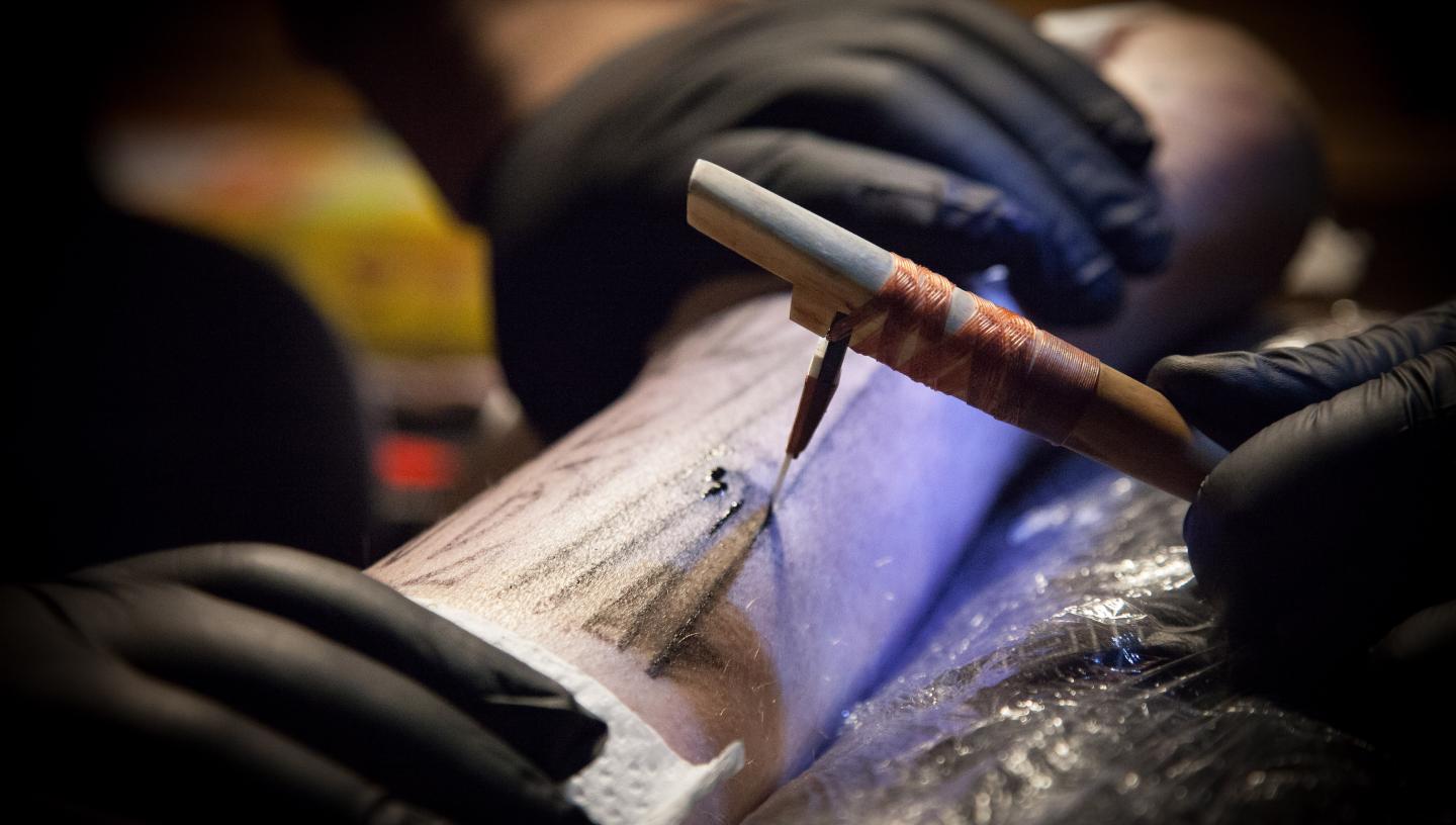 Te Rangitu Netana using traditional Ta Moko / Maori Tattooing