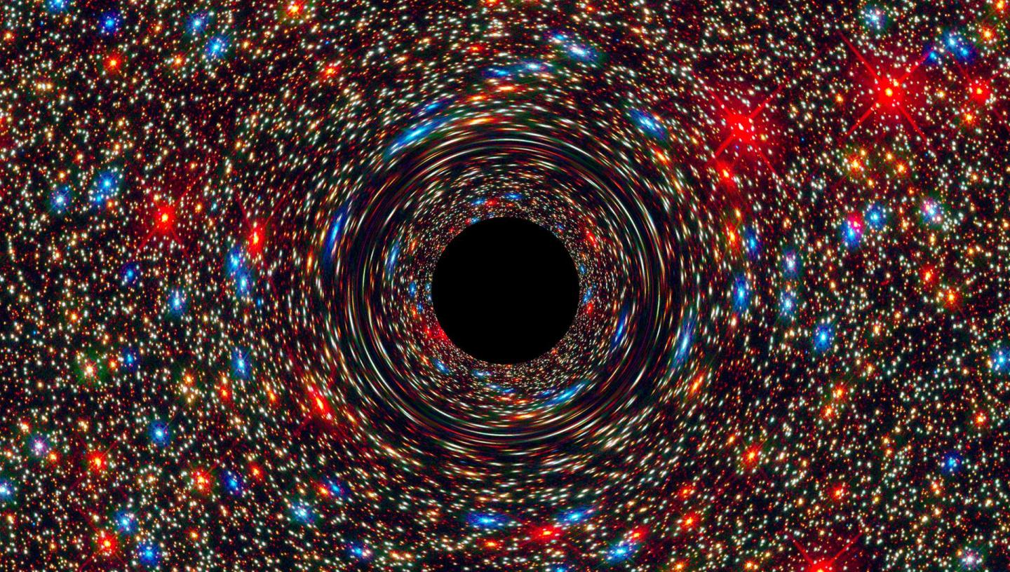 A computer-simulated image shows a supermassive black hole