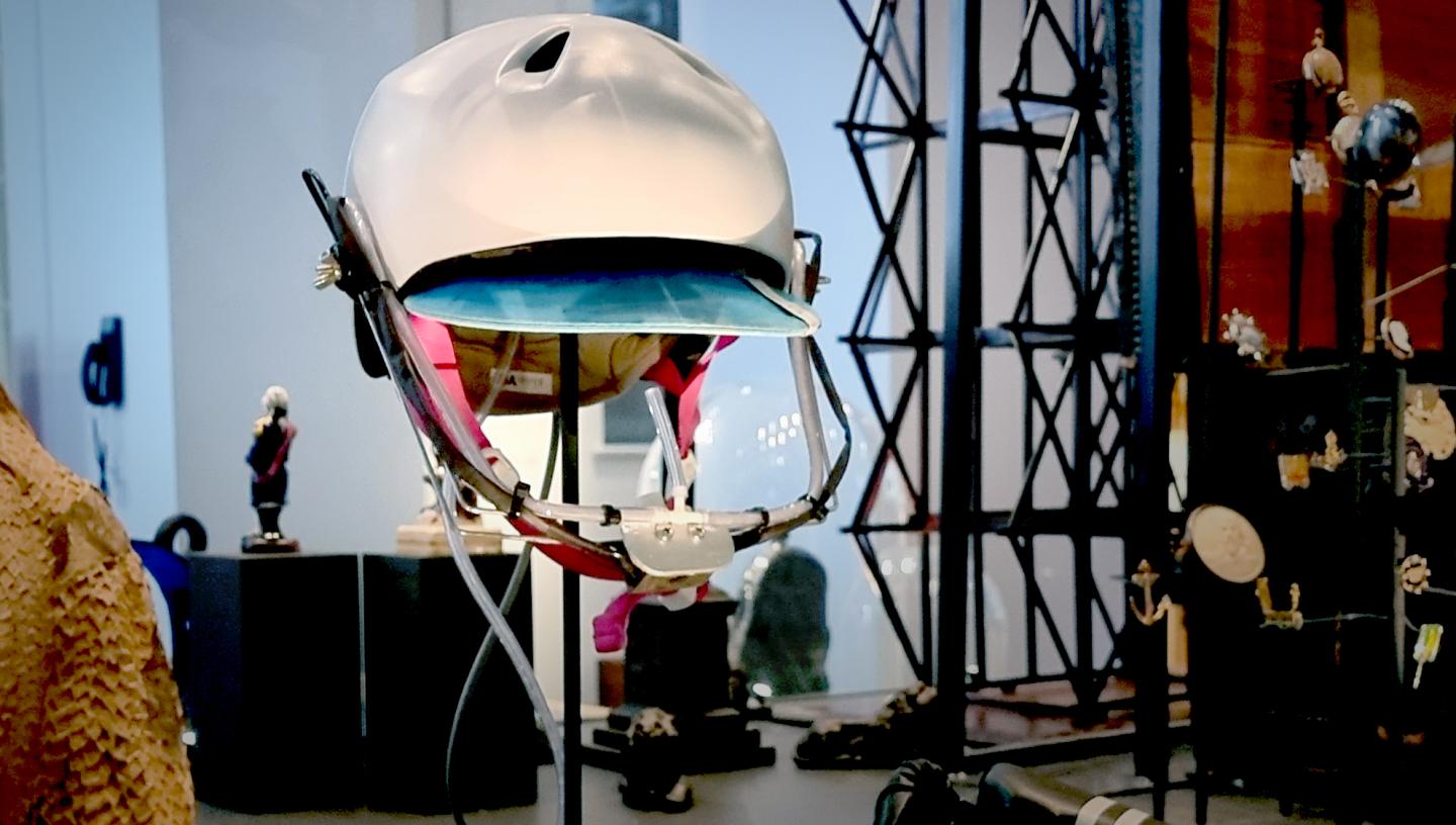 Natasha Lambert sip and puff helmet on display in the Sea Things gallery at the National Maritime Museum