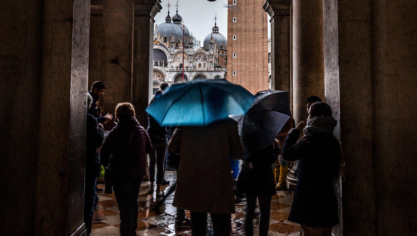 People waiting for the rain to clear in Venice