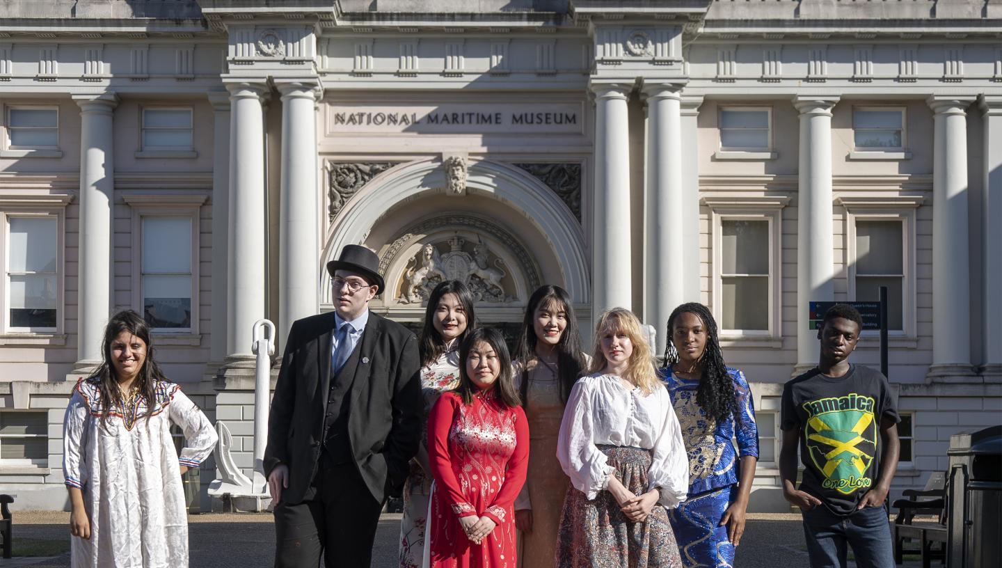 The youth collective pose in front of the National Maritime Museum. 