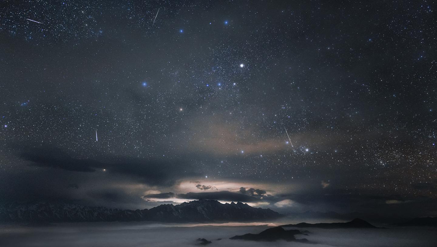 Quadrantid meteor shower over mountains
