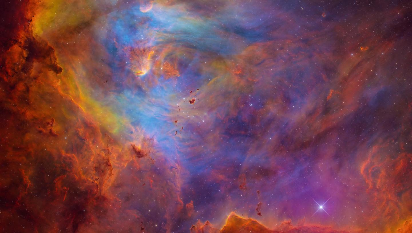 Rich red, yellow and blue colours of Running Chicken Nebula