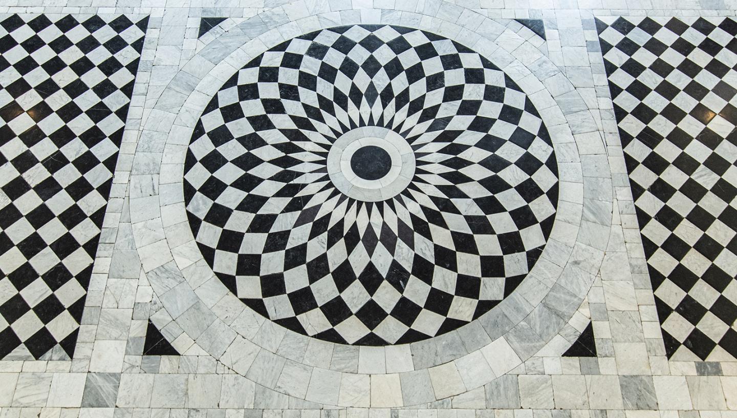 Black and white checkerboard floor of the Great Hall in the Queen's House