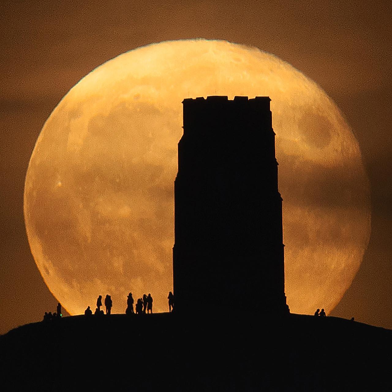 An image showing 'Equinox Moon and Glastonbury Tor'