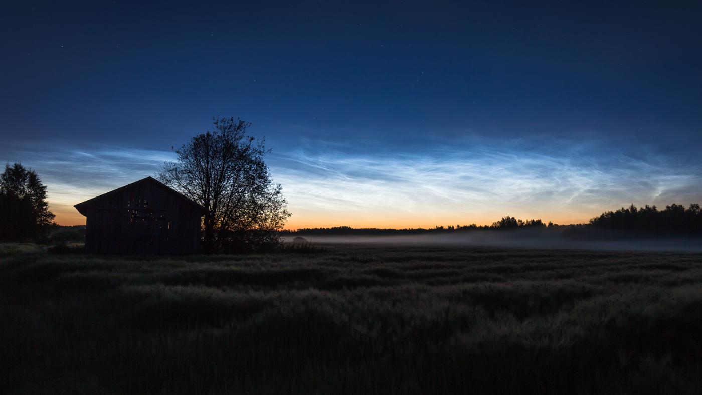An image showing 'Lonely Barn under Noctilucent Clouds by Petri Puurunen - Astronomy Photographer of the Year 2016'