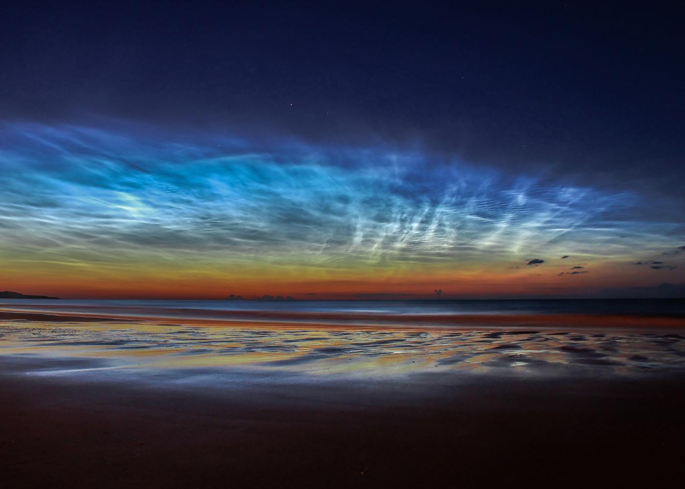 An image showing 'Sunderland Noctilucent Cloud display by Matt Robinson - Astronomy Photographer of the Year 2015'