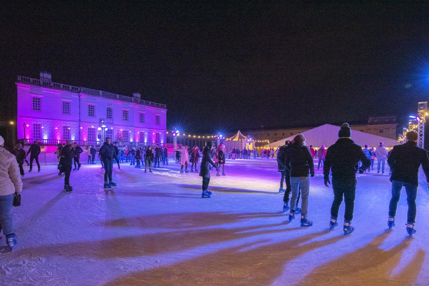 An image showing 'Come at night to see the Queen's House all lit up'