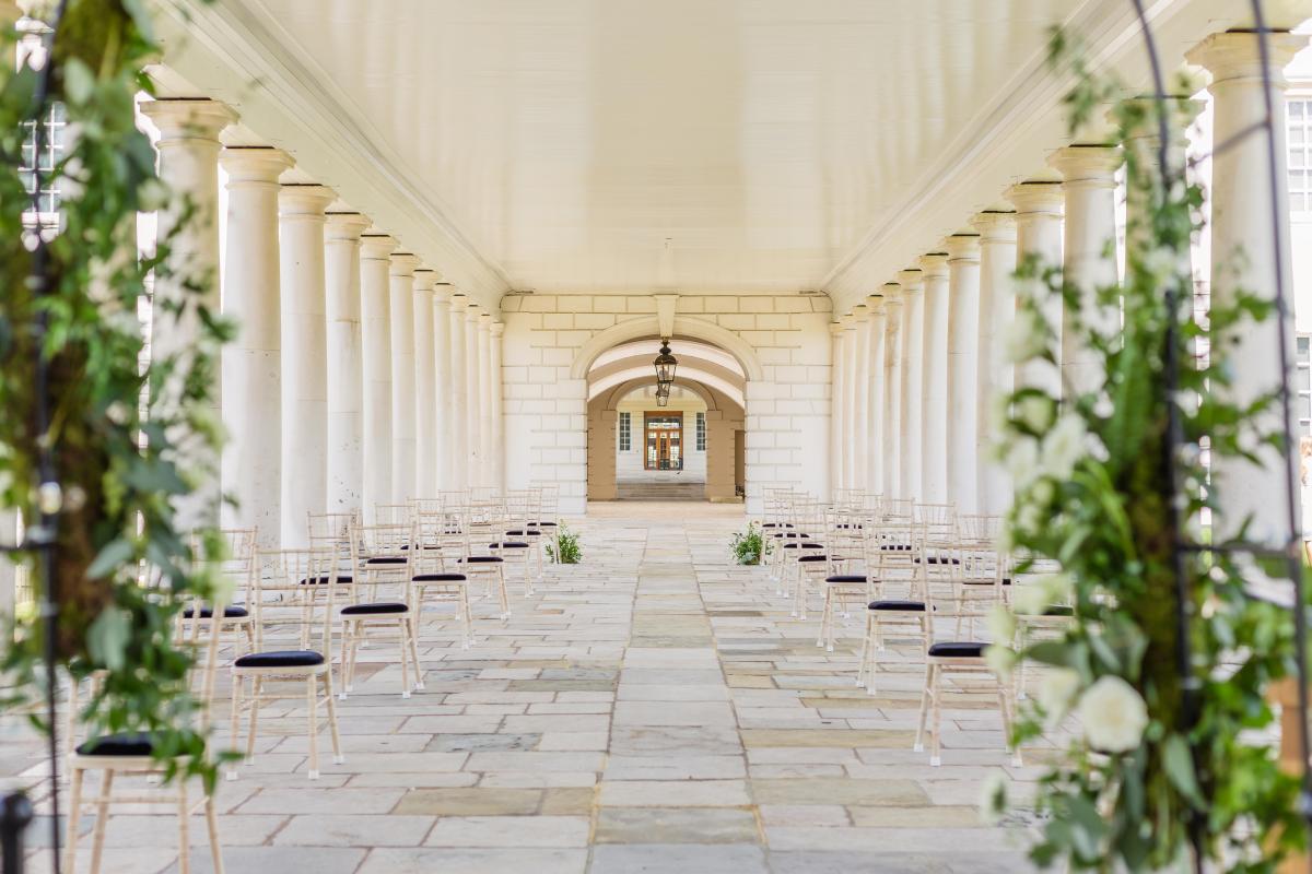 Outdoor wedding ceremony on the colonnades