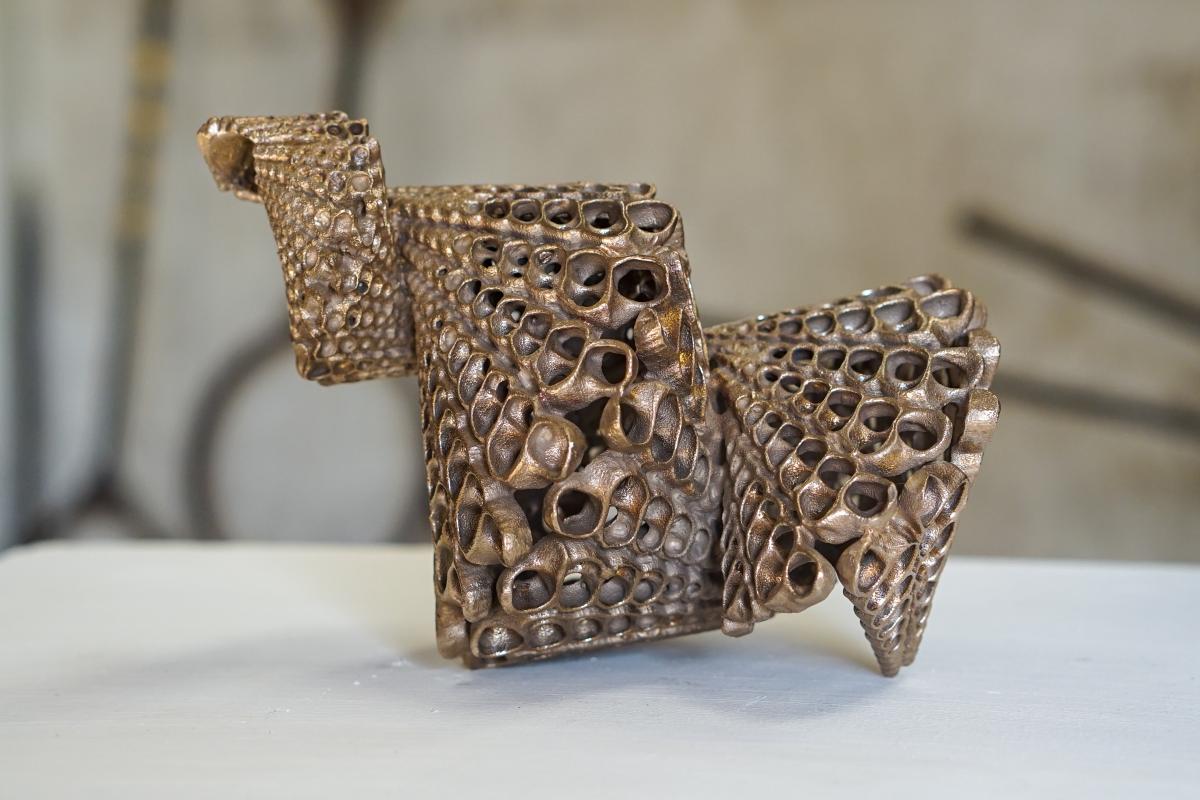 A bronze shell-like sculpture by artist Rowan Mersh