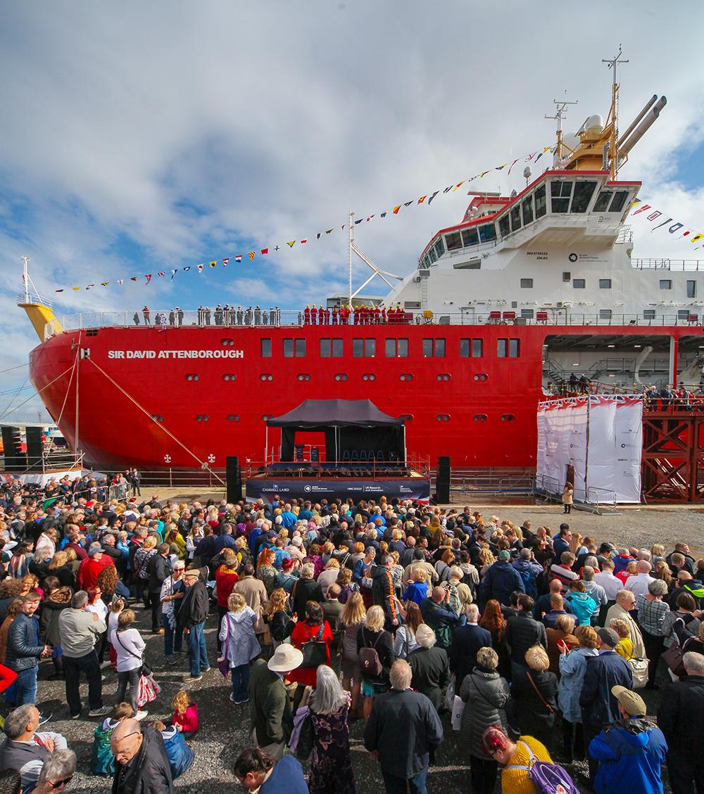 Crowd gathers to watch the ceremonial naming of RRS Sir David Attenborough at Cammell Laird Shipyard in 2019