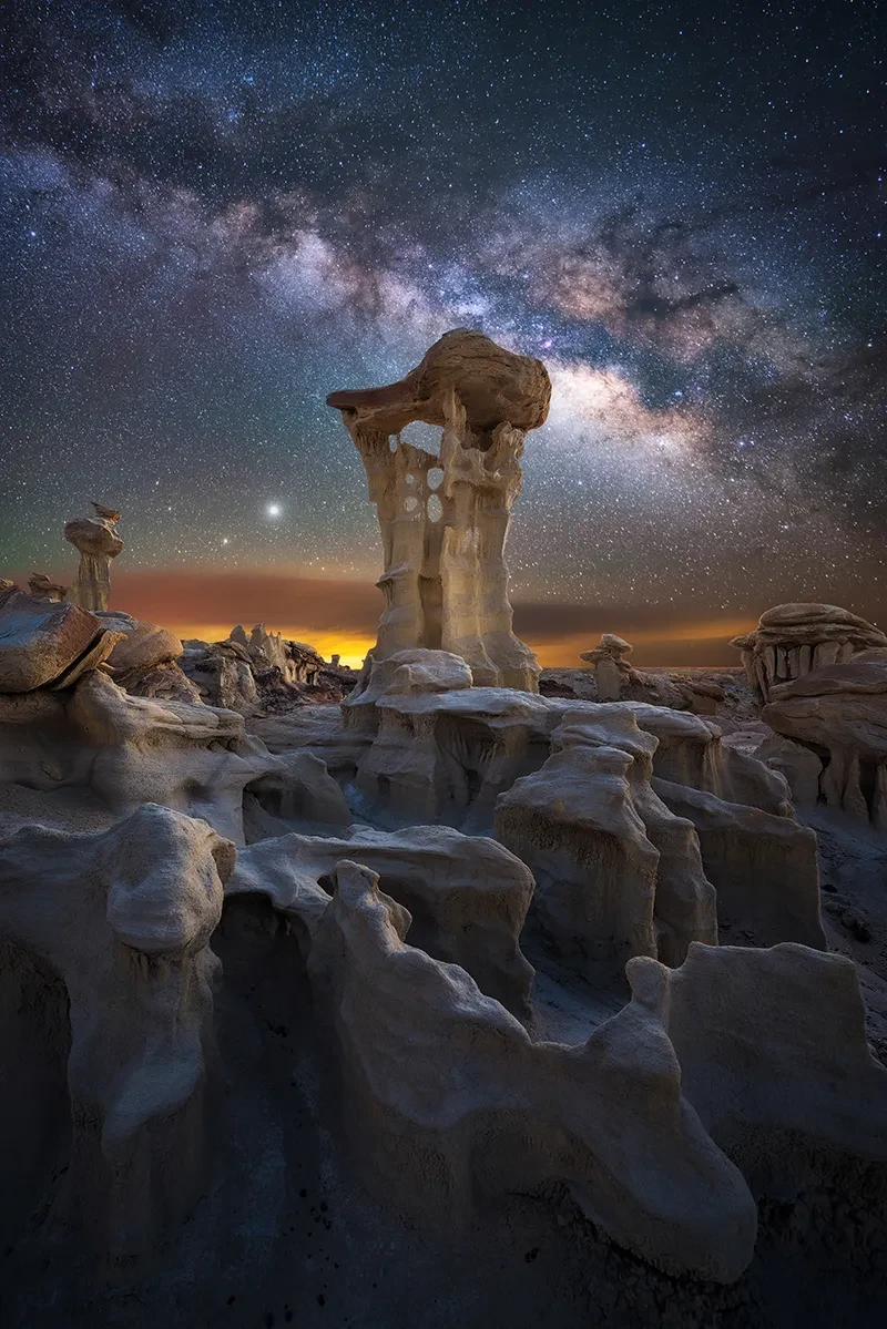 Rock spire in New Mexico sits underneath the Milky Way