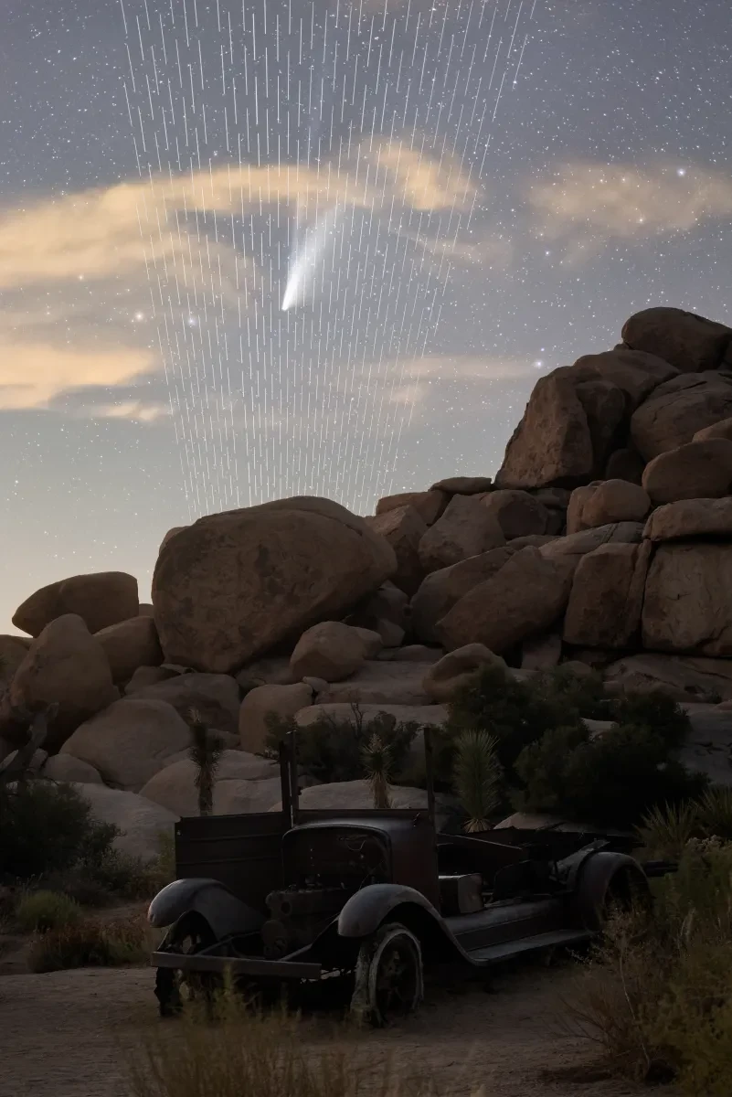 An abandoned car amongst rocks in California. Comet Neowise shoots down from above