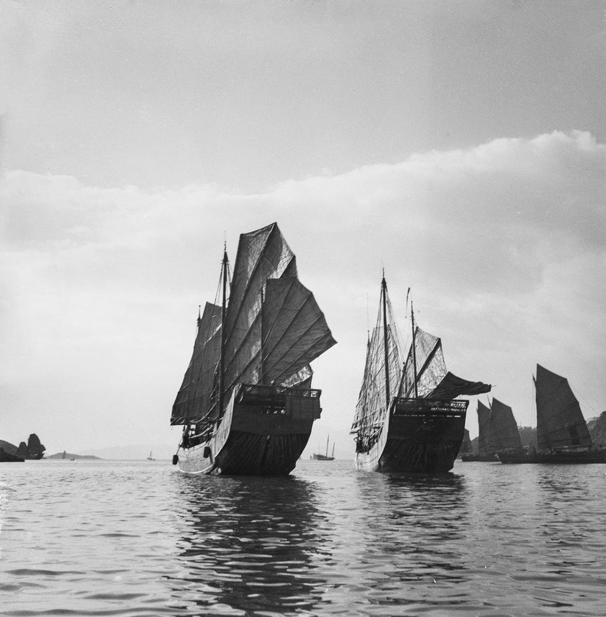 A black and white historic photograph of a Chinese sailing ship