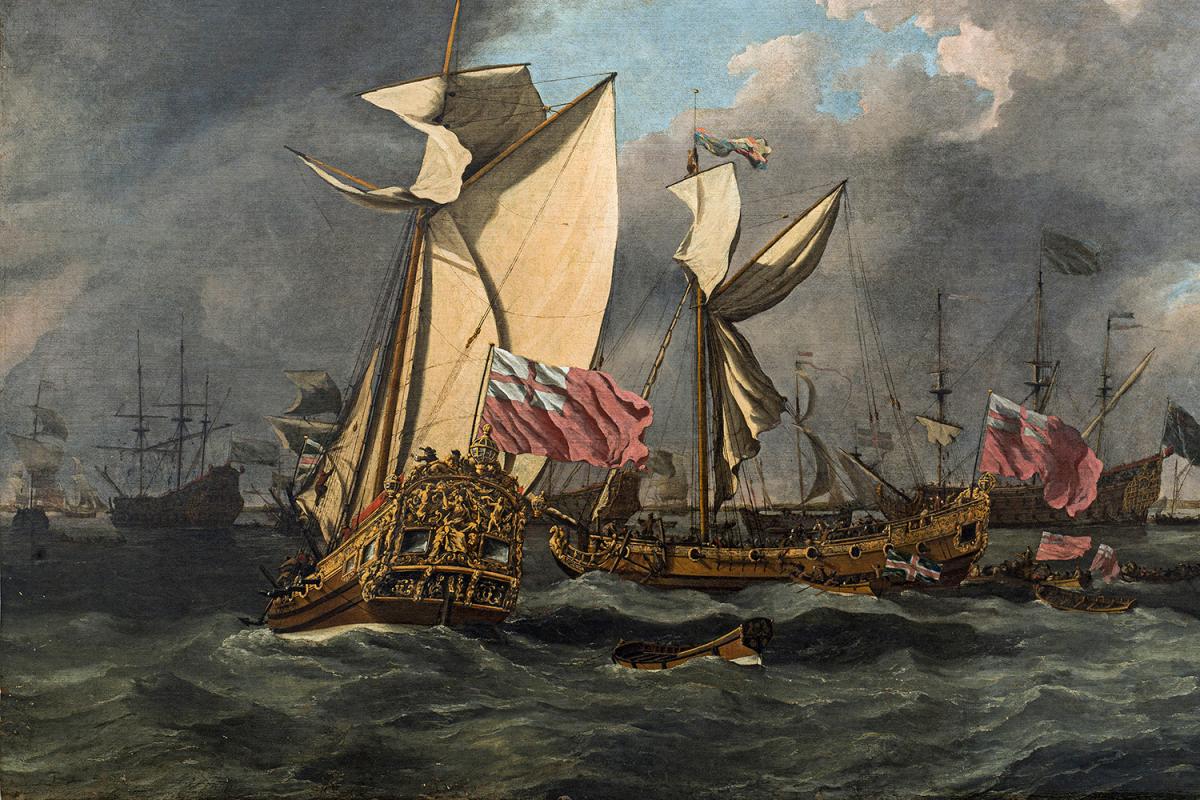 A close up from a maritime oil painting, showing a sailing ship with an ornate stern decoration. Sunlight is catching the sails