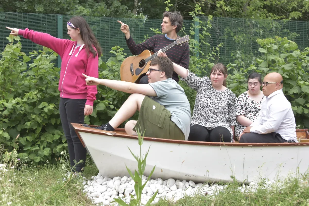 Members of the club in a boat