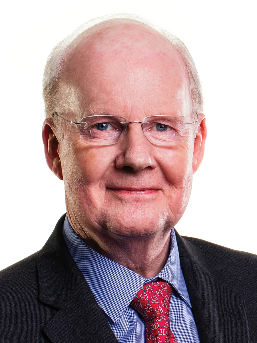 A portrait photograph of Royal Museums Greenwich Trustee Murdoch MacLennan