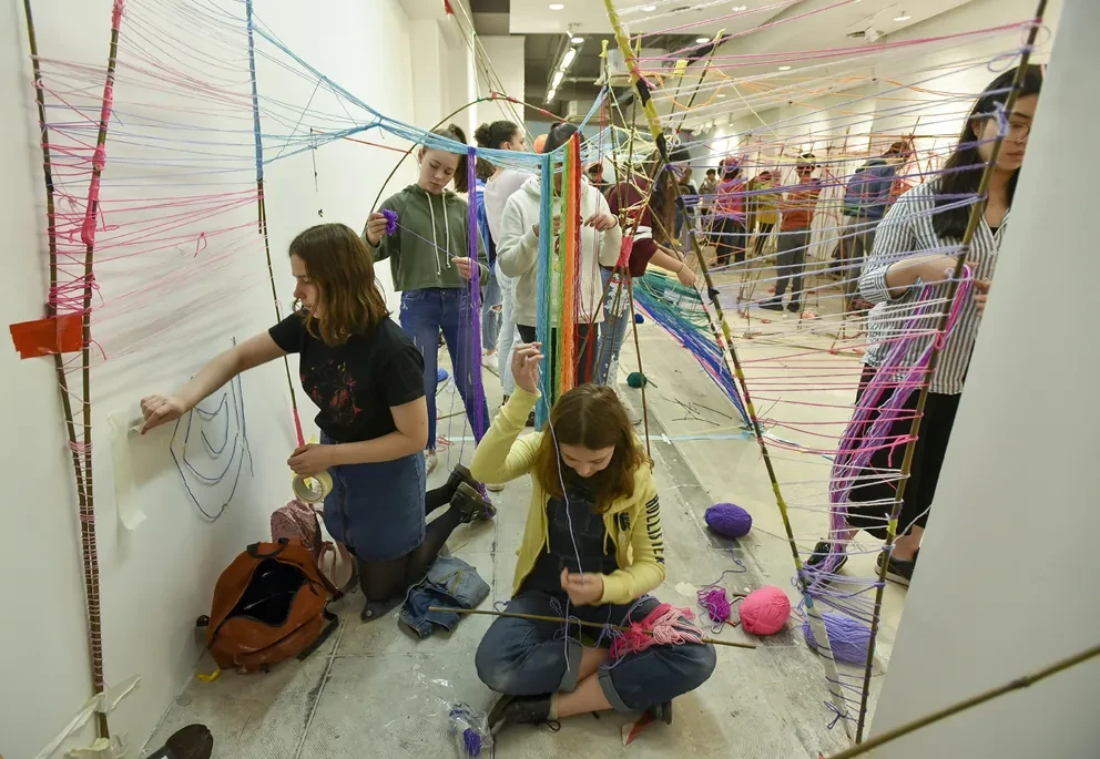 Young people make an artwork