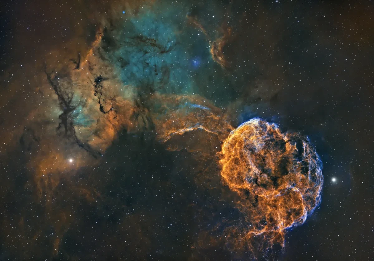 Deep space photograph showing the nebulae known as IC 443 and IC 444