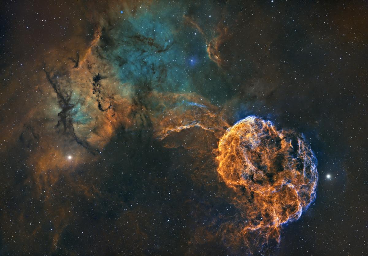 Deep space photograph showing the nebulae known as IC 443 and IC 444