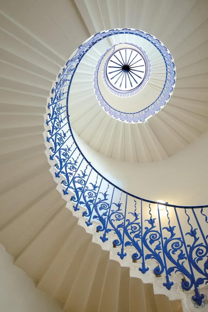 Looking up the white and blue spiral Tulip Stairs in the Queen's House.
