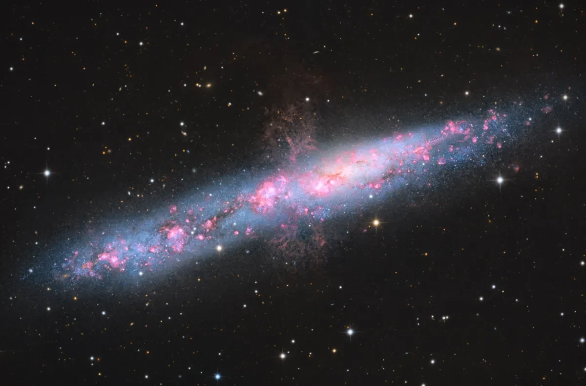 Side on image of a red spiral galaxy