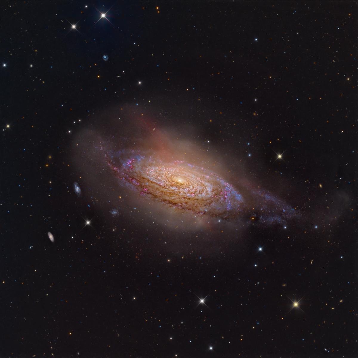Image of colourful spiral galaxy at an angle