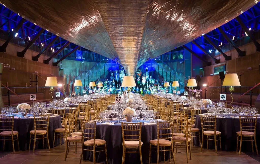 Set up of round tables under the Hull at Cutty Sark - credit to Greg Allen