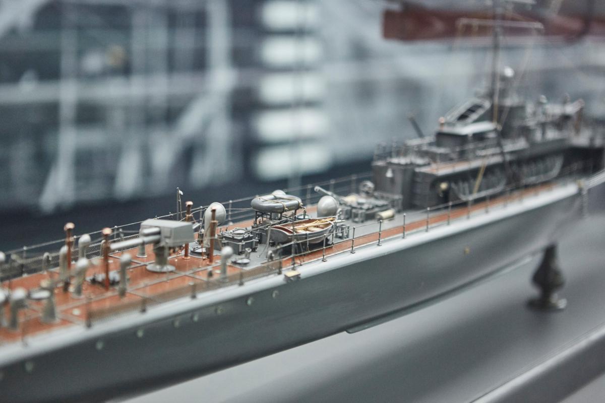 Close-up view of a model of a 20th century warship, on display in the Forgotten Fighters gallery of the National Maritime Museum