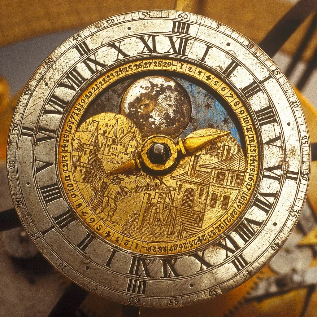 Detail of a celestial clockwork globe, showing a clockface with Roman numerals around the dial