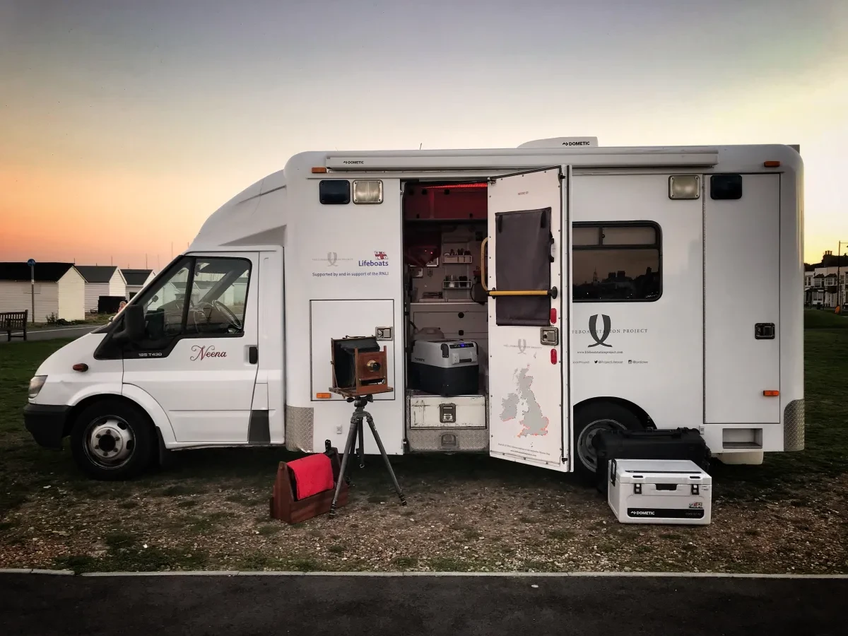 Picture of a white ambulance converted into a photographic darkroom